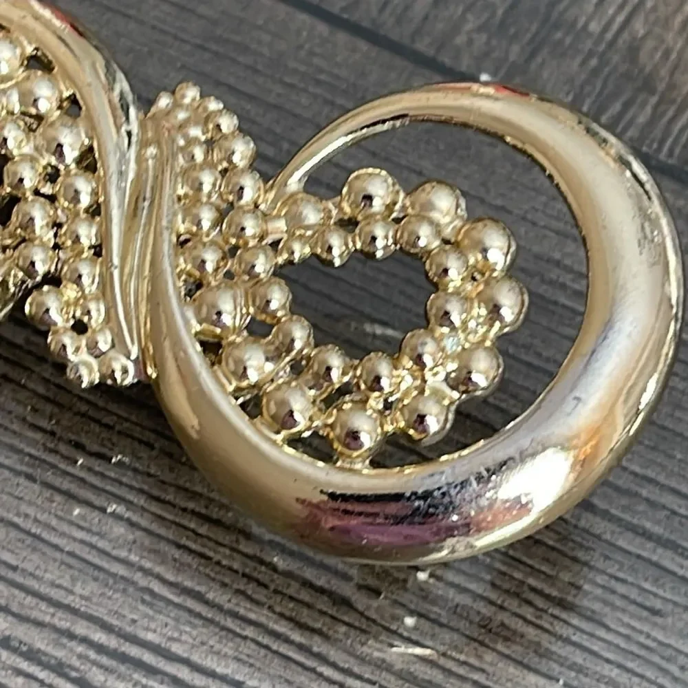 Vintage VAL Elegant Infinity Gold-tone Brooch